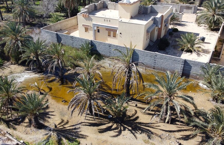 Water-logged earth near a home in Libya's coastal city of Zliten